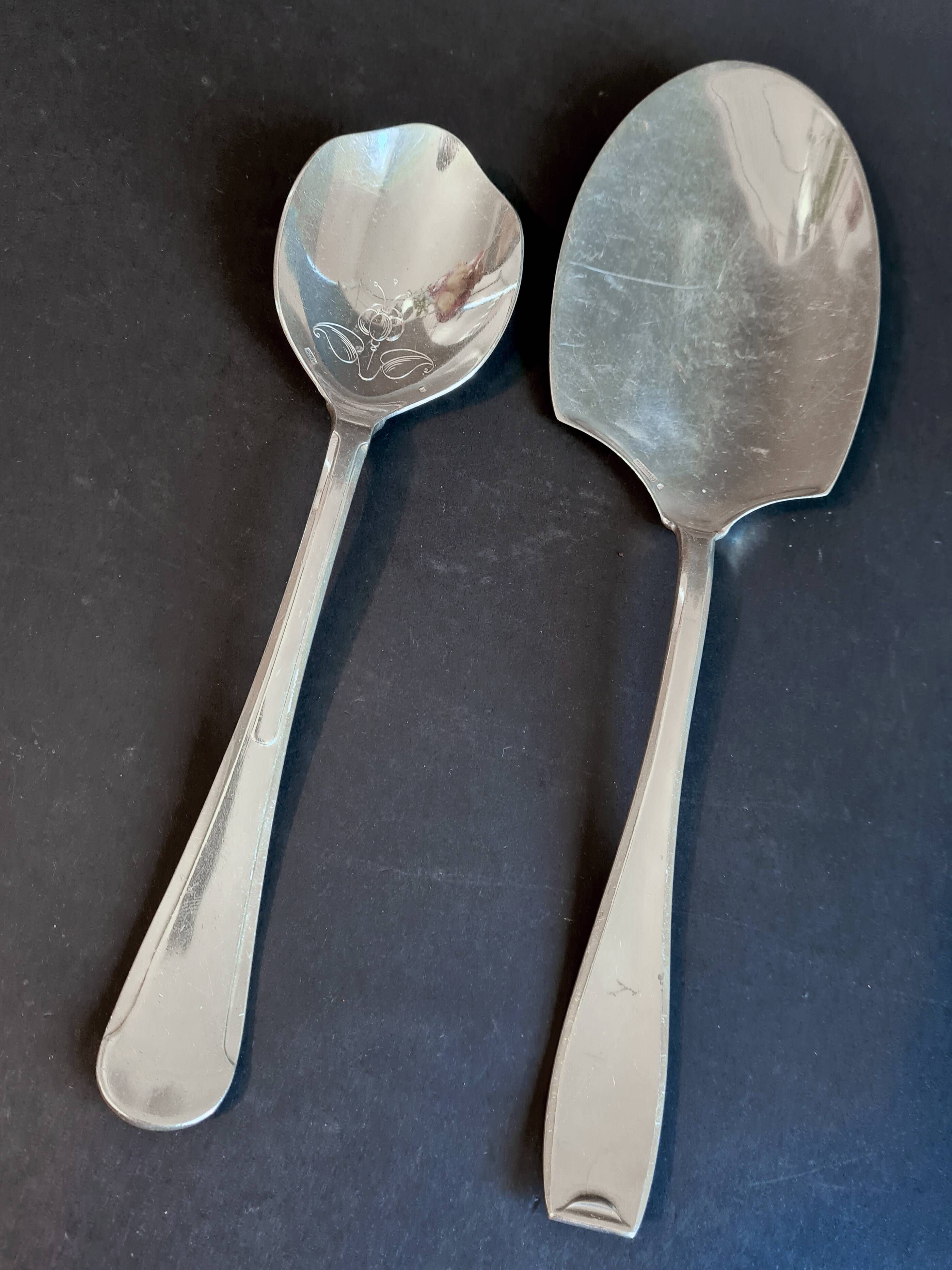 Silver-plated metal serving spoon and French fry shovel signed "Wiskmann"
