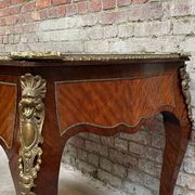 Antique French-style desk with green leather top and bronze mounts