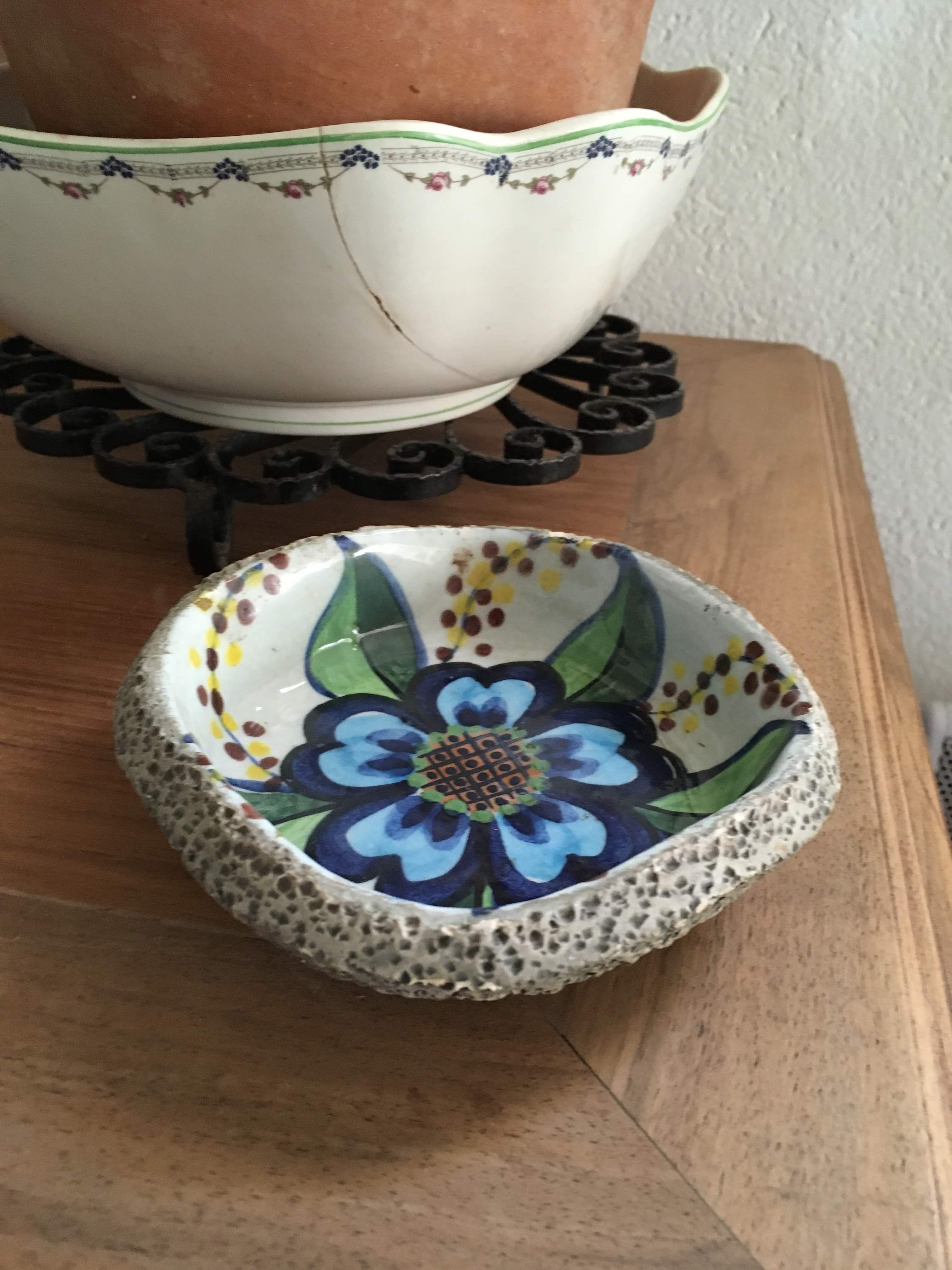 Cup lava foam with blue flower.