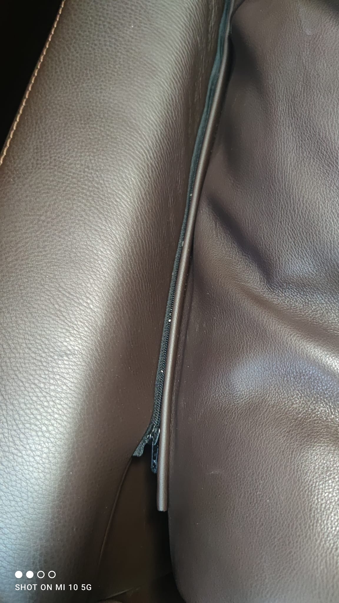 Four-seater sofa in dark brown leather from Steiner by designer Pascal Daveluy, model