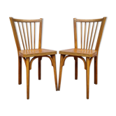 Paire de chaises bistrot estampillées Baumann, années 50-60