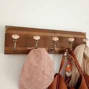 Vintage wall coat rack with 5 ceramic hooks featuring floral patterns - wood