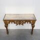 Console murale dorée et sculptée de style baroque italien du XXe siècle