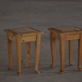 A pair of antique Danish pine stools from the late 19th century.