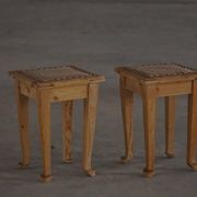 A pair of antique Danish pine stools from the late 19th century.