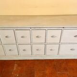 Solid wood sideboard with drawers.