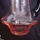 Art Deco orangeade service in pink-orange glass, twisted model.