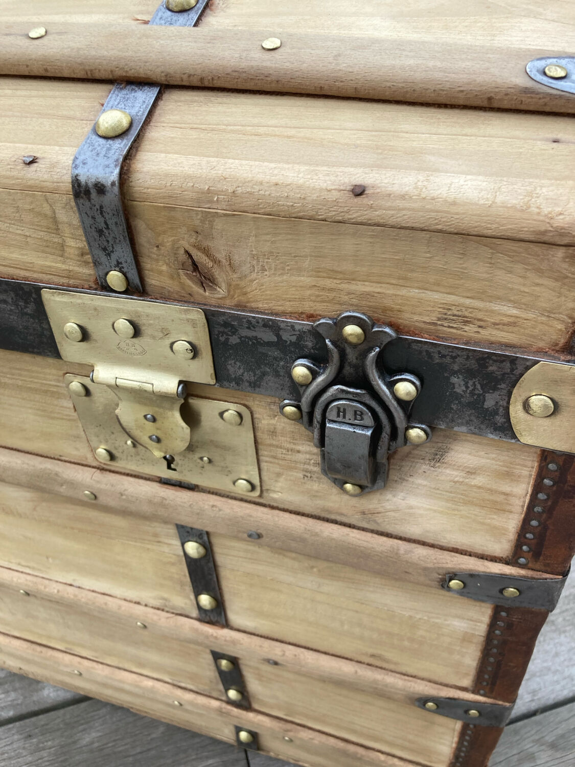 Exceptional curved leather/brass box with beautiful restored clasps.