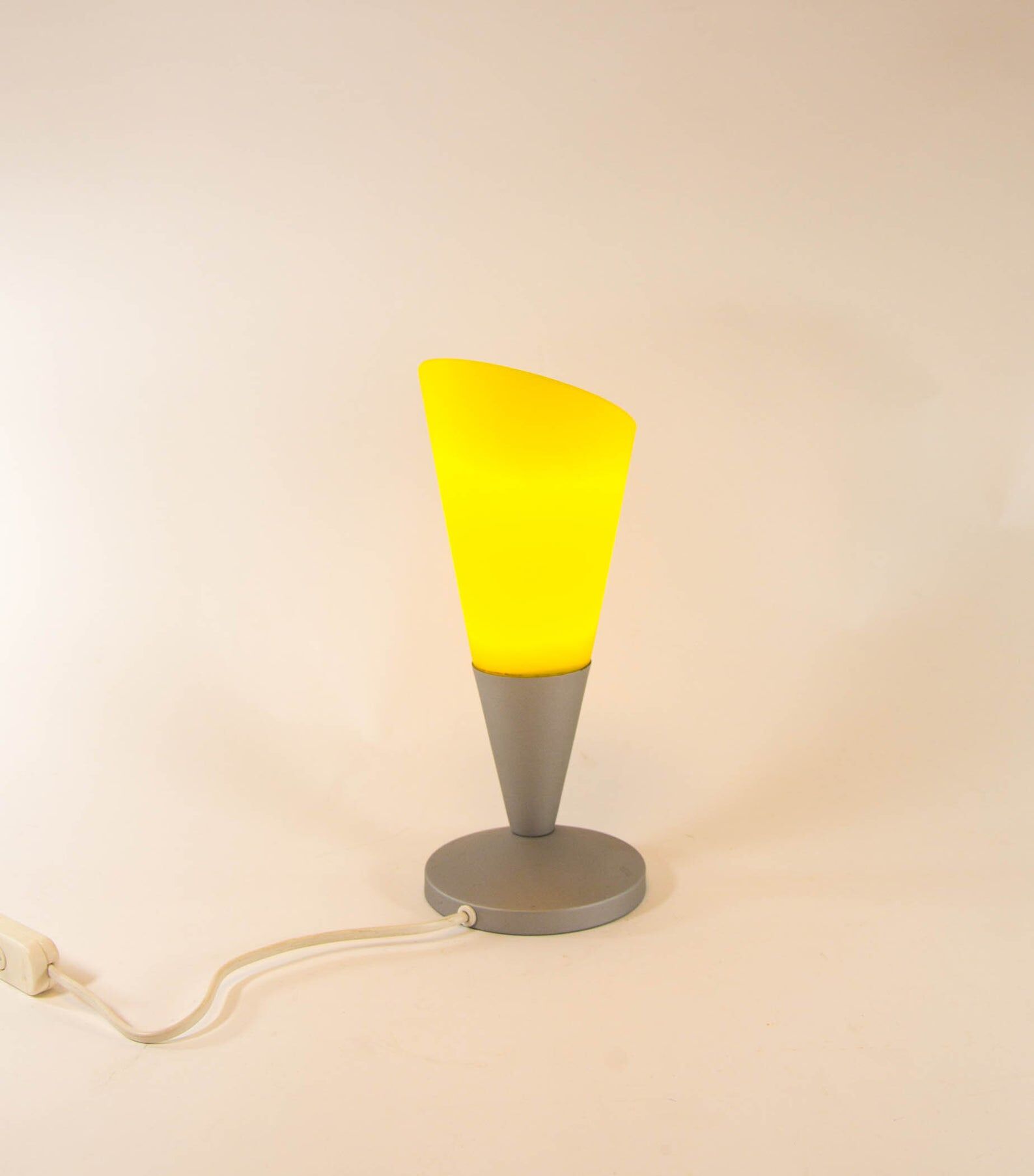 Elegant lamp of the space age in bright yellow glass 90s