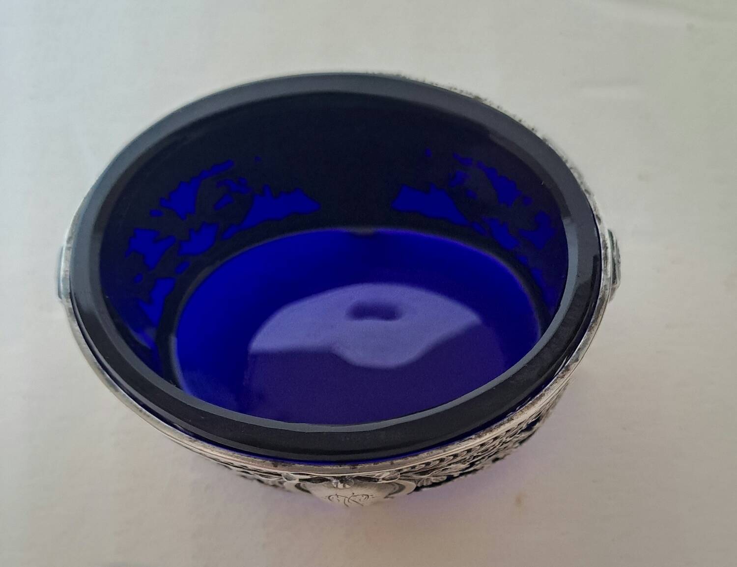 Louis XVI style salt cellar with silver collar mount and blue glass