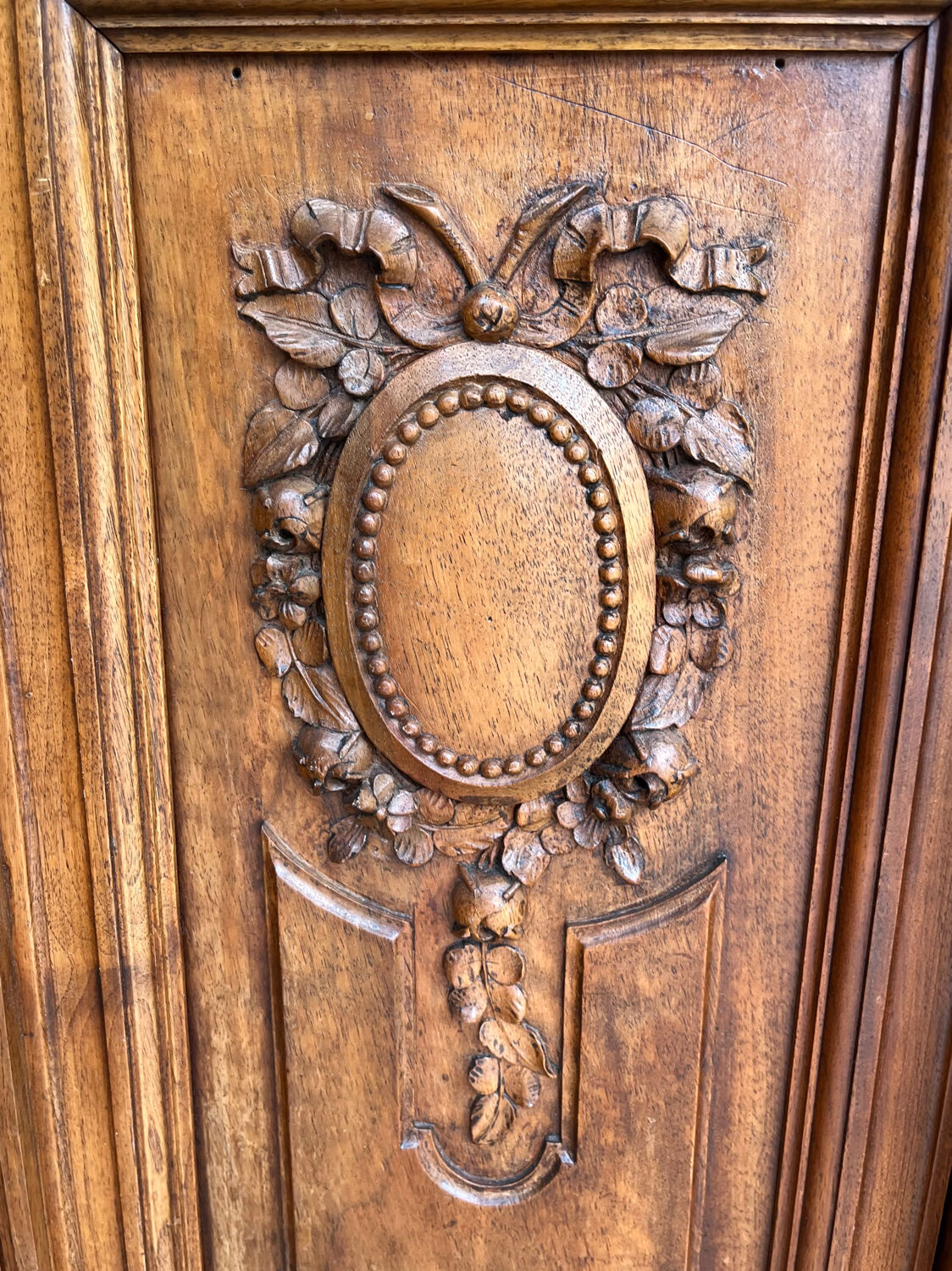 Antique carved wooden bookcase