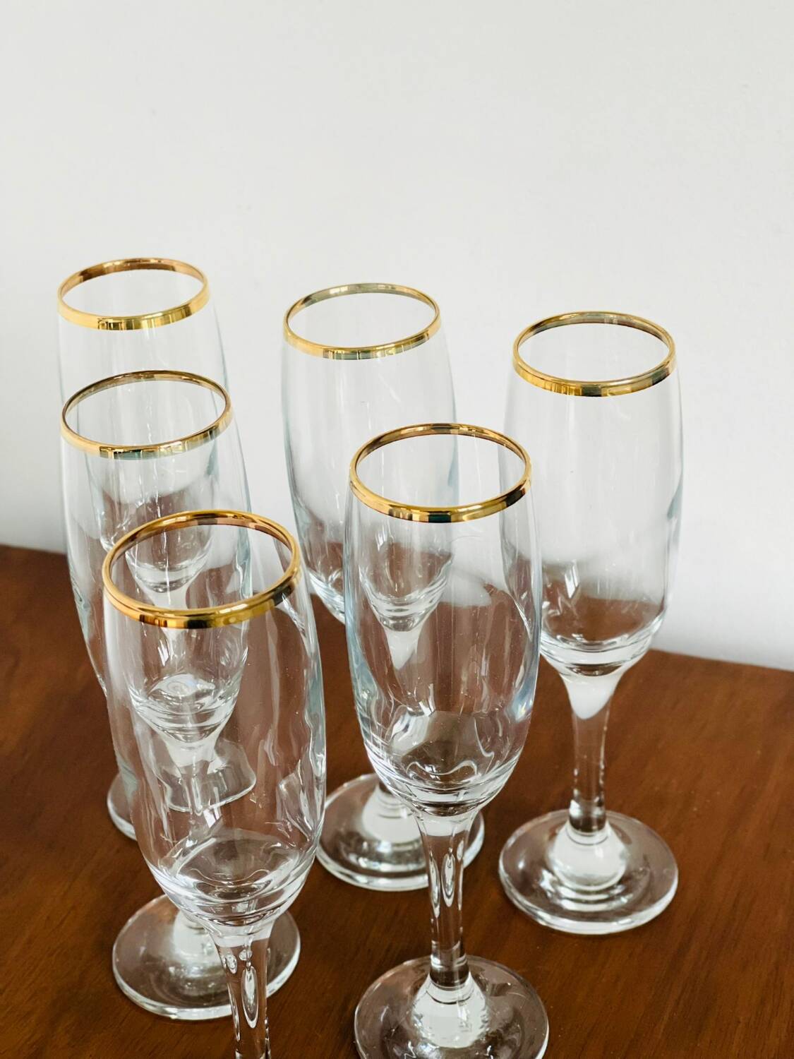 Gold rimmed champagne flutes