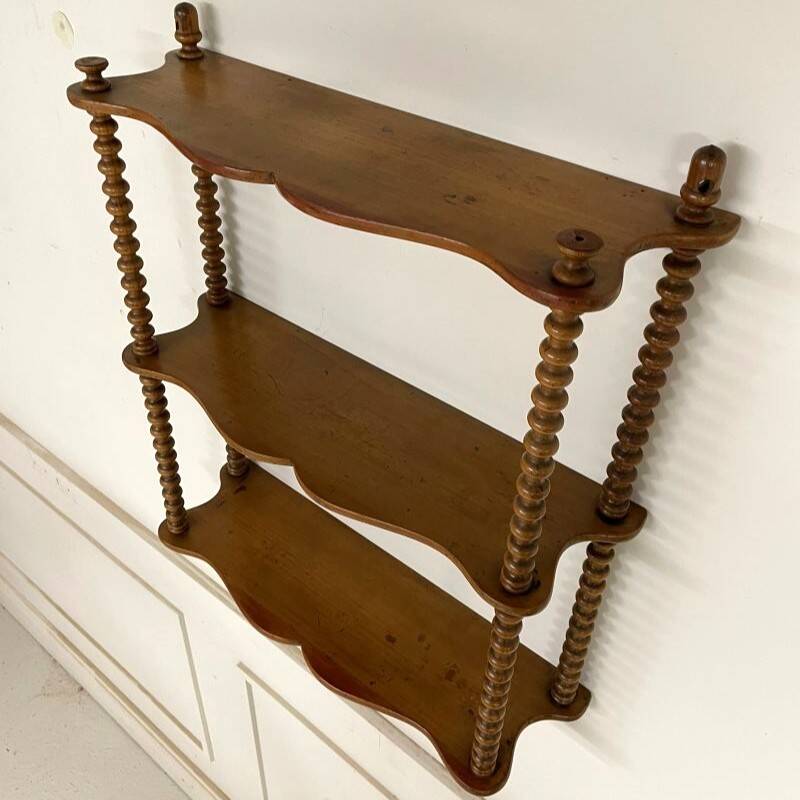 Vintage turned wood wall shelf with 3 levels.