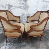 Pair of armchairs basket louis XV in carved walnut