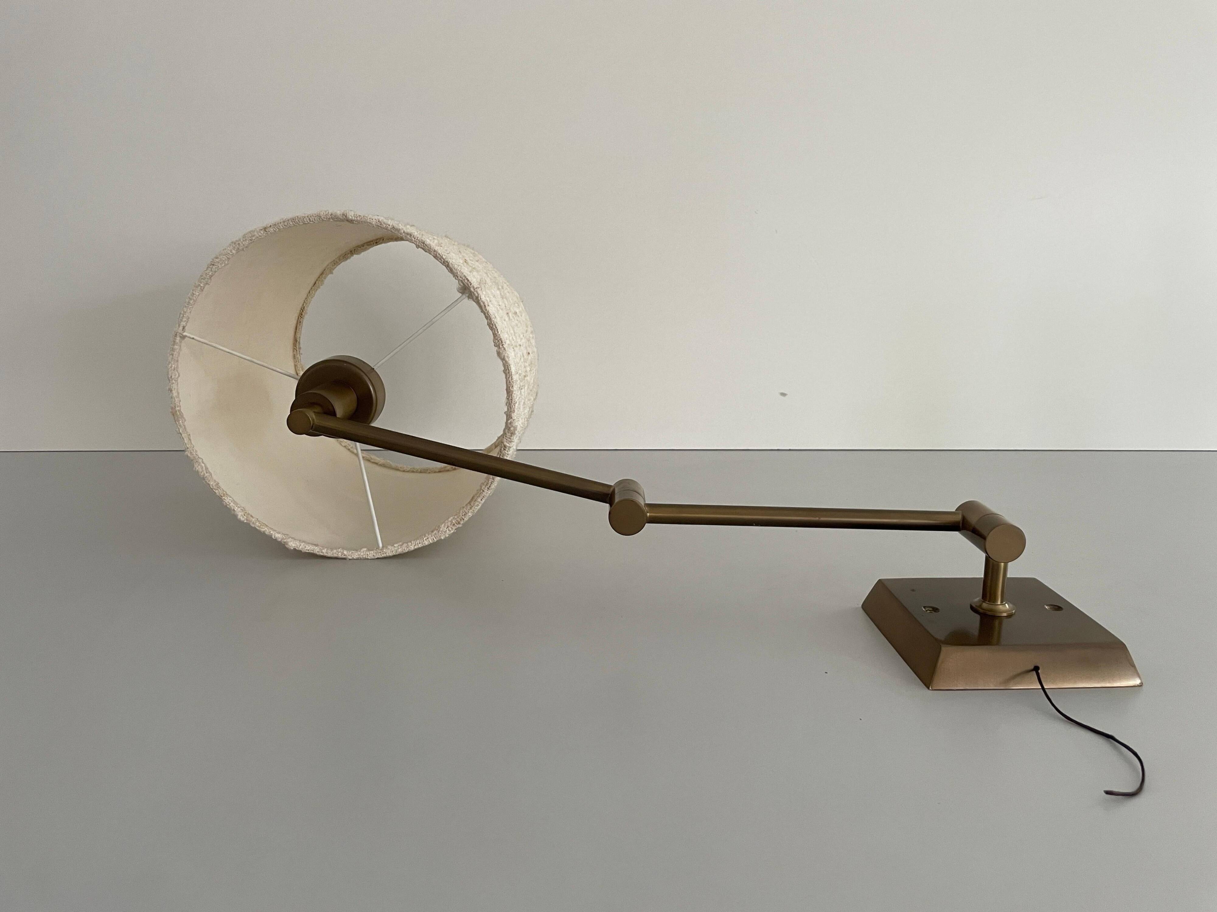 Adjustable brass wall lamp with fabric shade, Danish design, 1970s, Denmark.