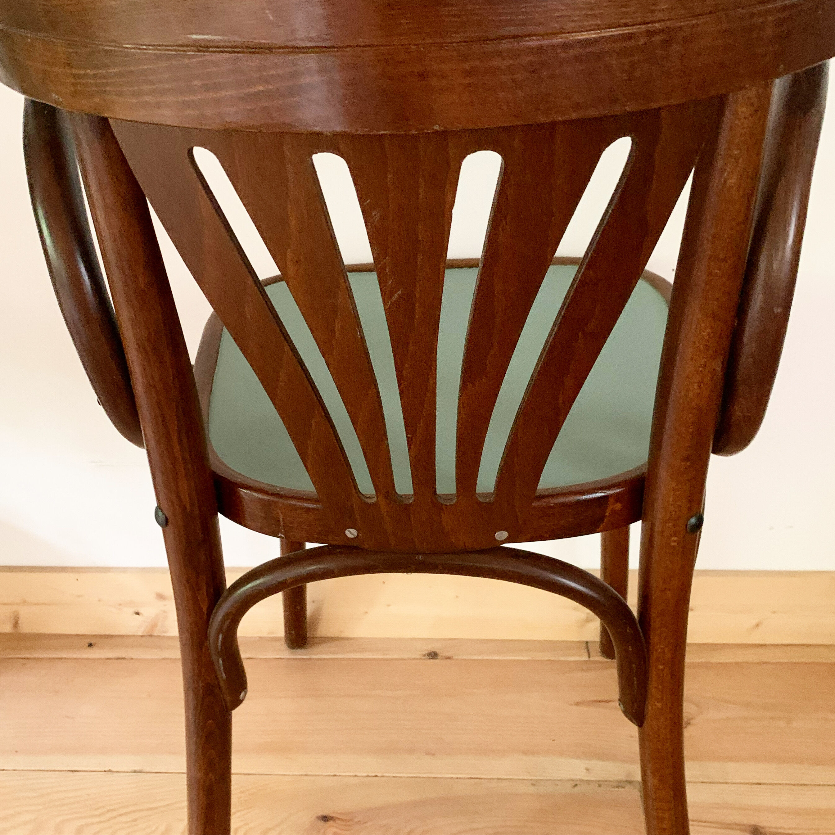 Vintage bistro chair with armrests