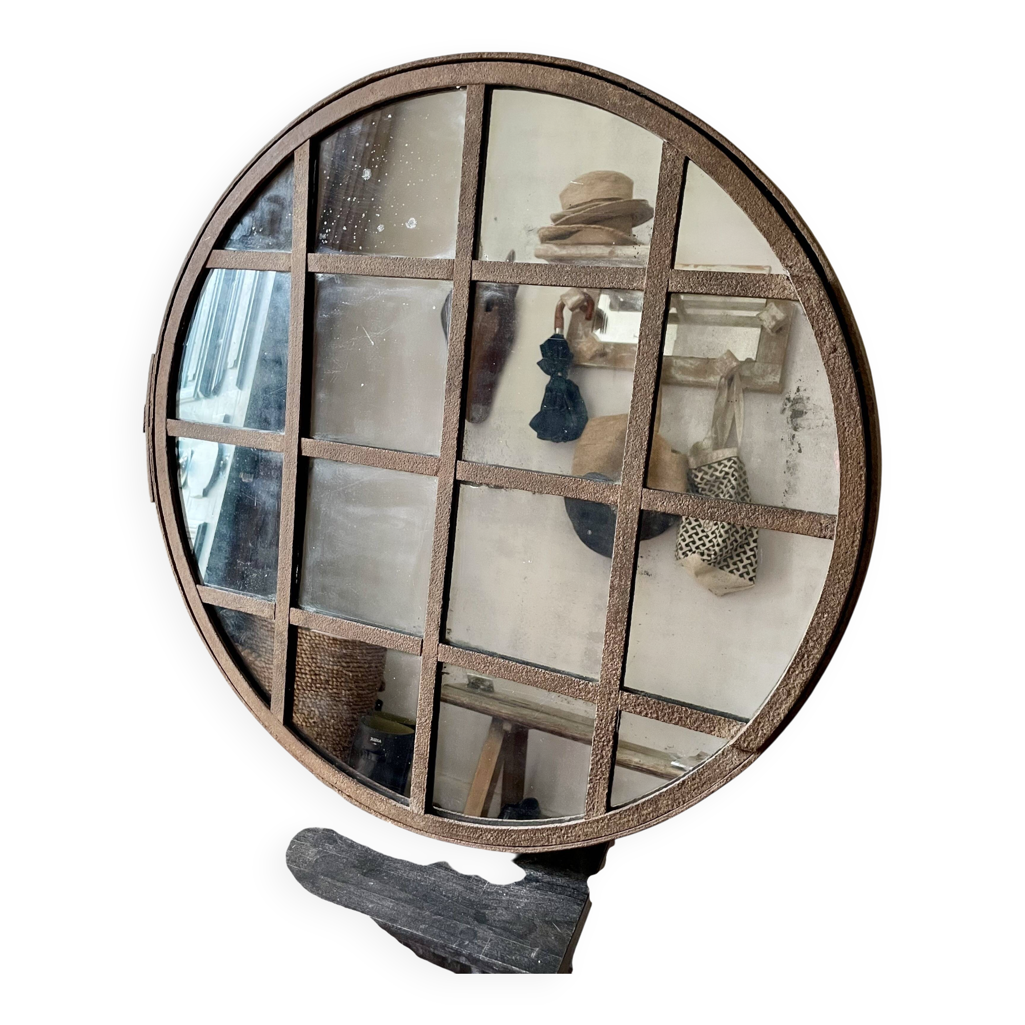 Round mirror mounted in mild steel