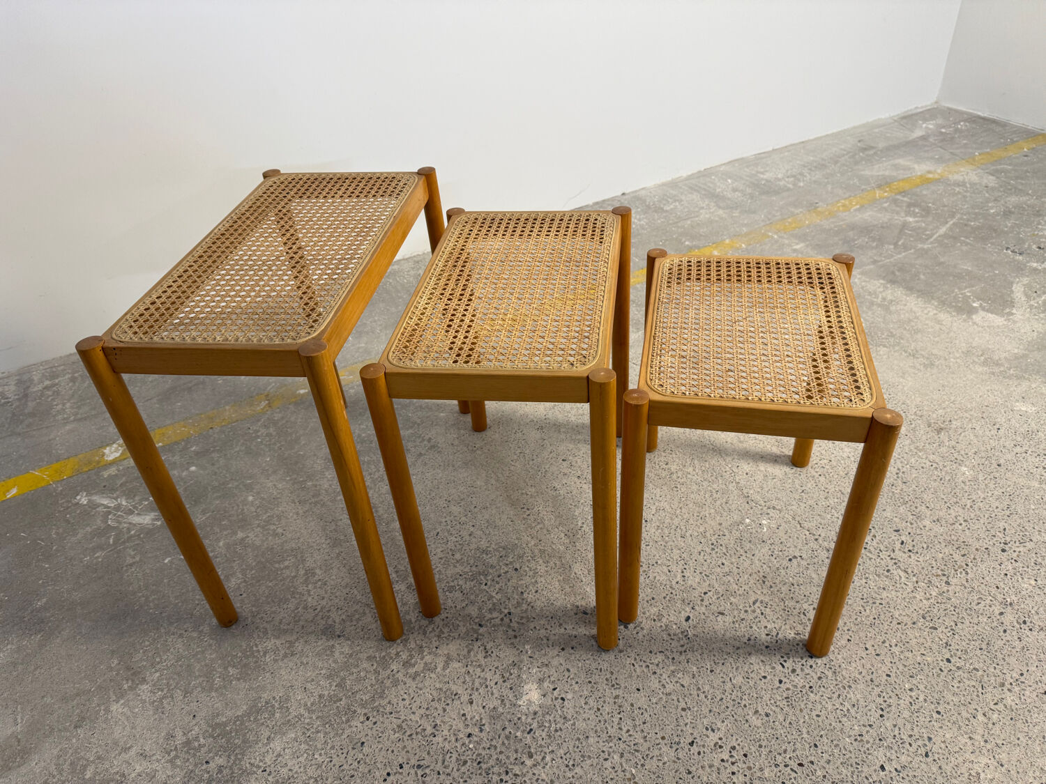 Set of Scandinavian nesting tables in wood and cane – 1960s