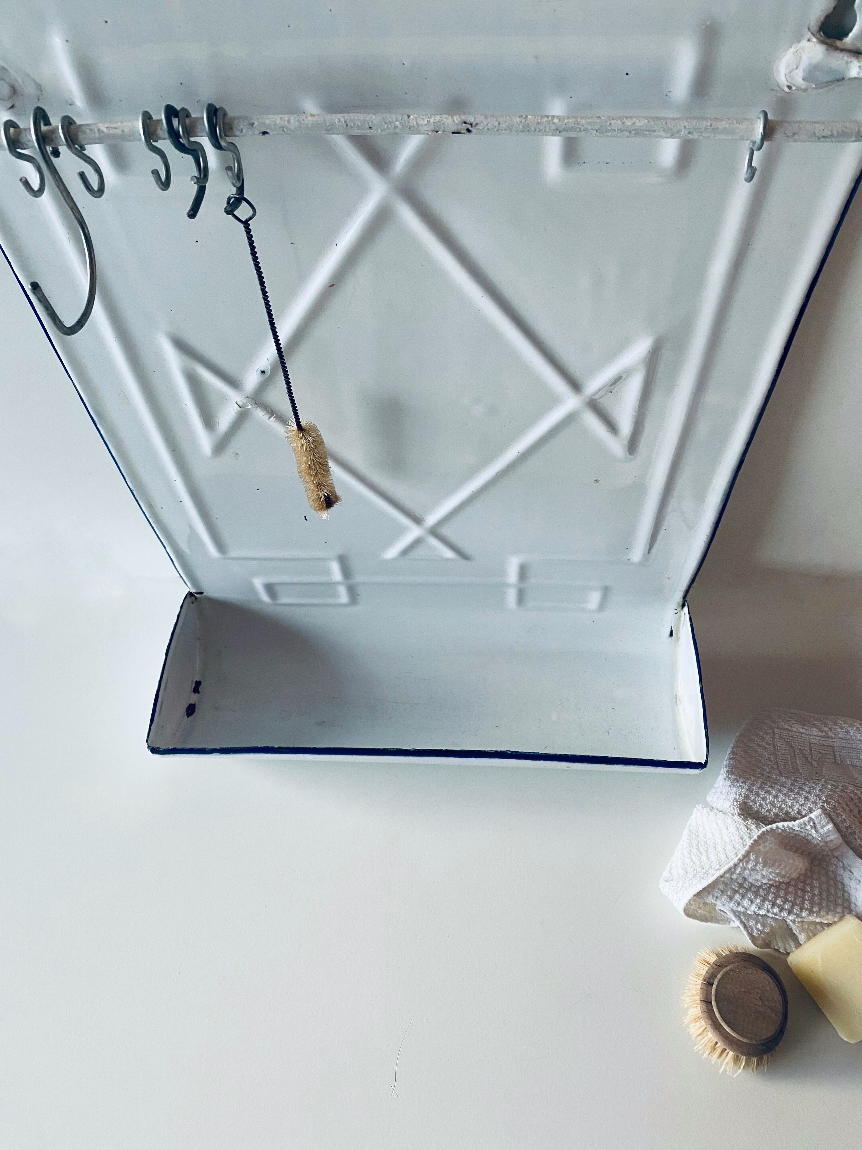 Old enamelled kitchen utensil display