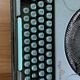 M.J. Rooy light green typewriter