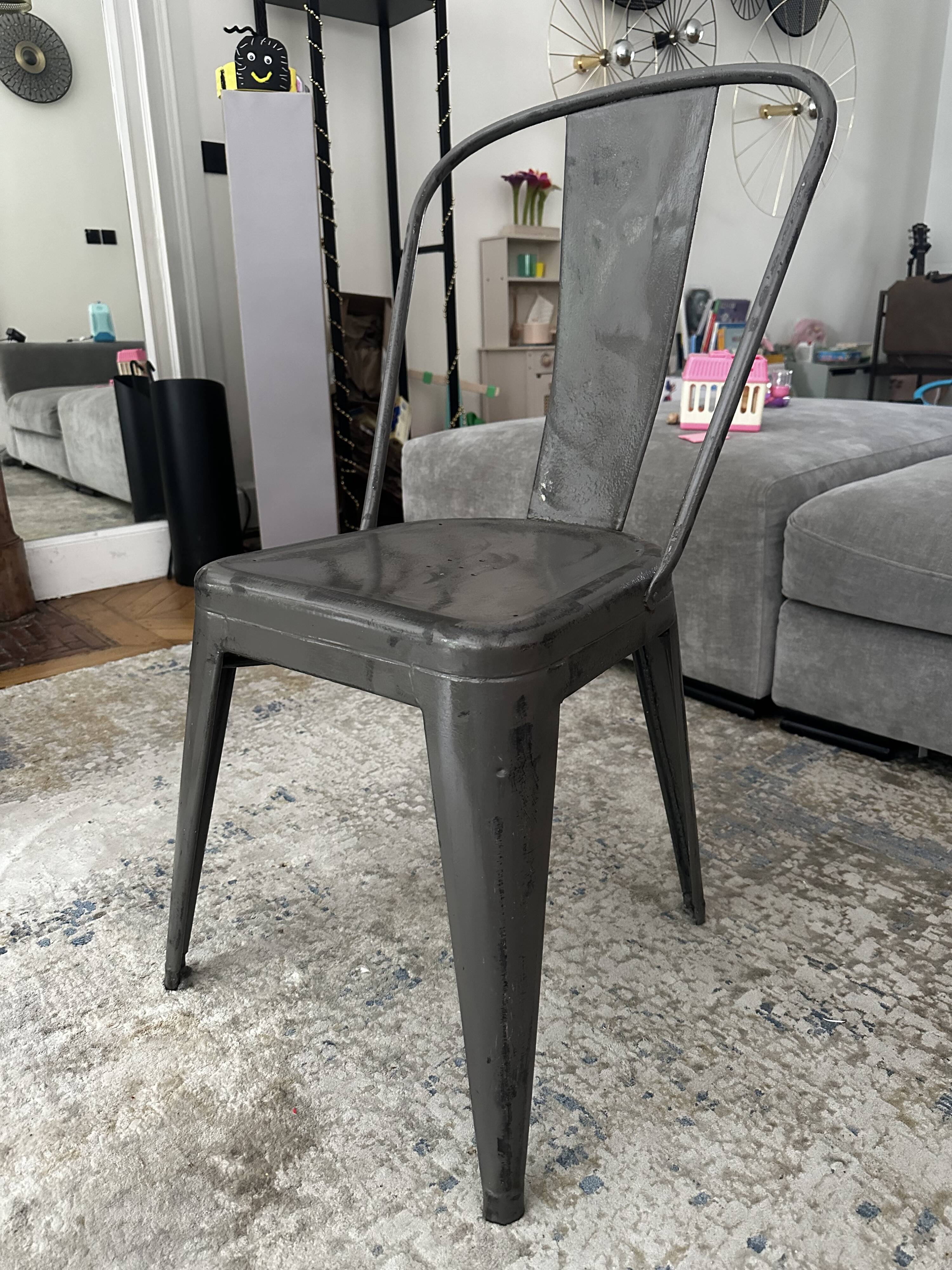 Pair of vintage Tolix model A chairs, designed by Xavier Pauchard.