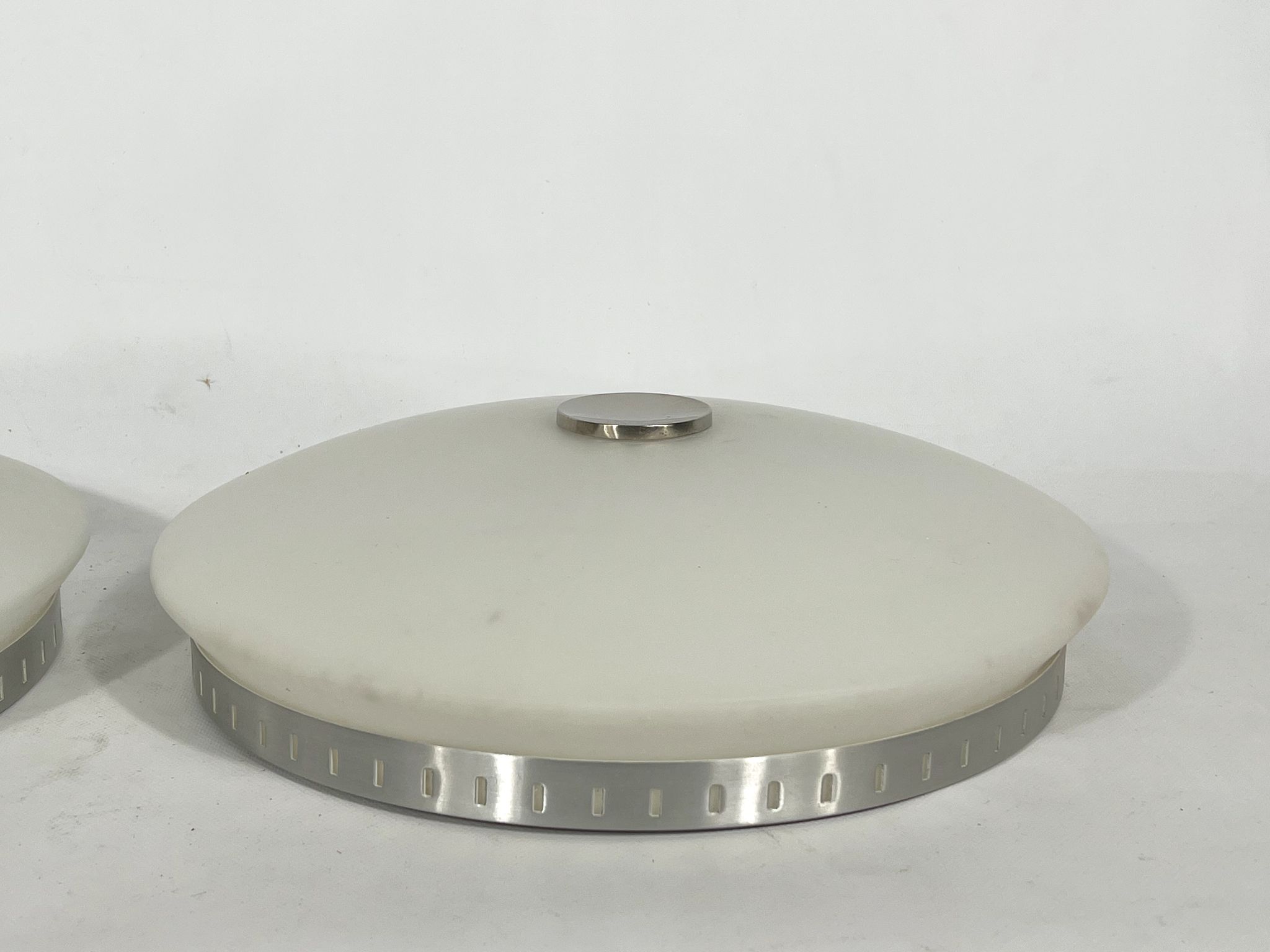 Stilux Milano, pair of round opaline glass ceiling lamps. 1960s