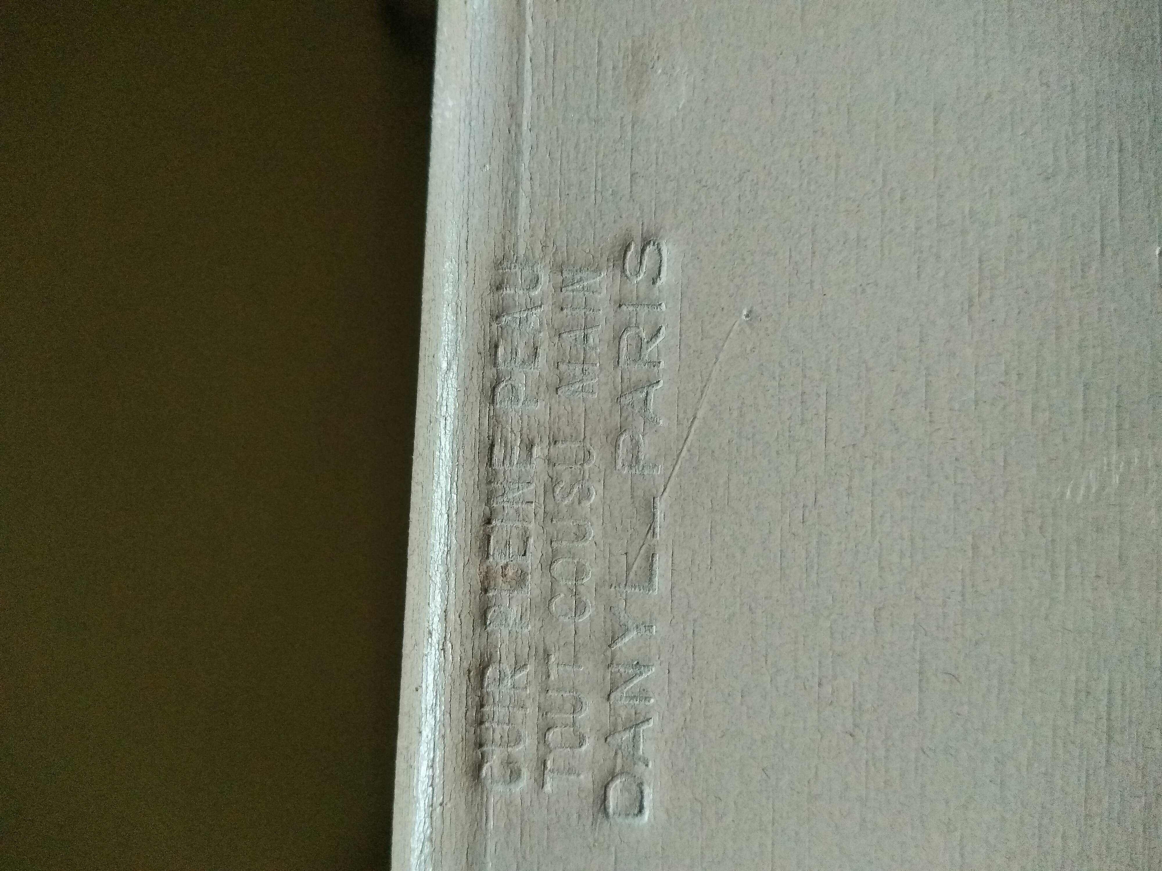 Old leather suitcase with its protective cover