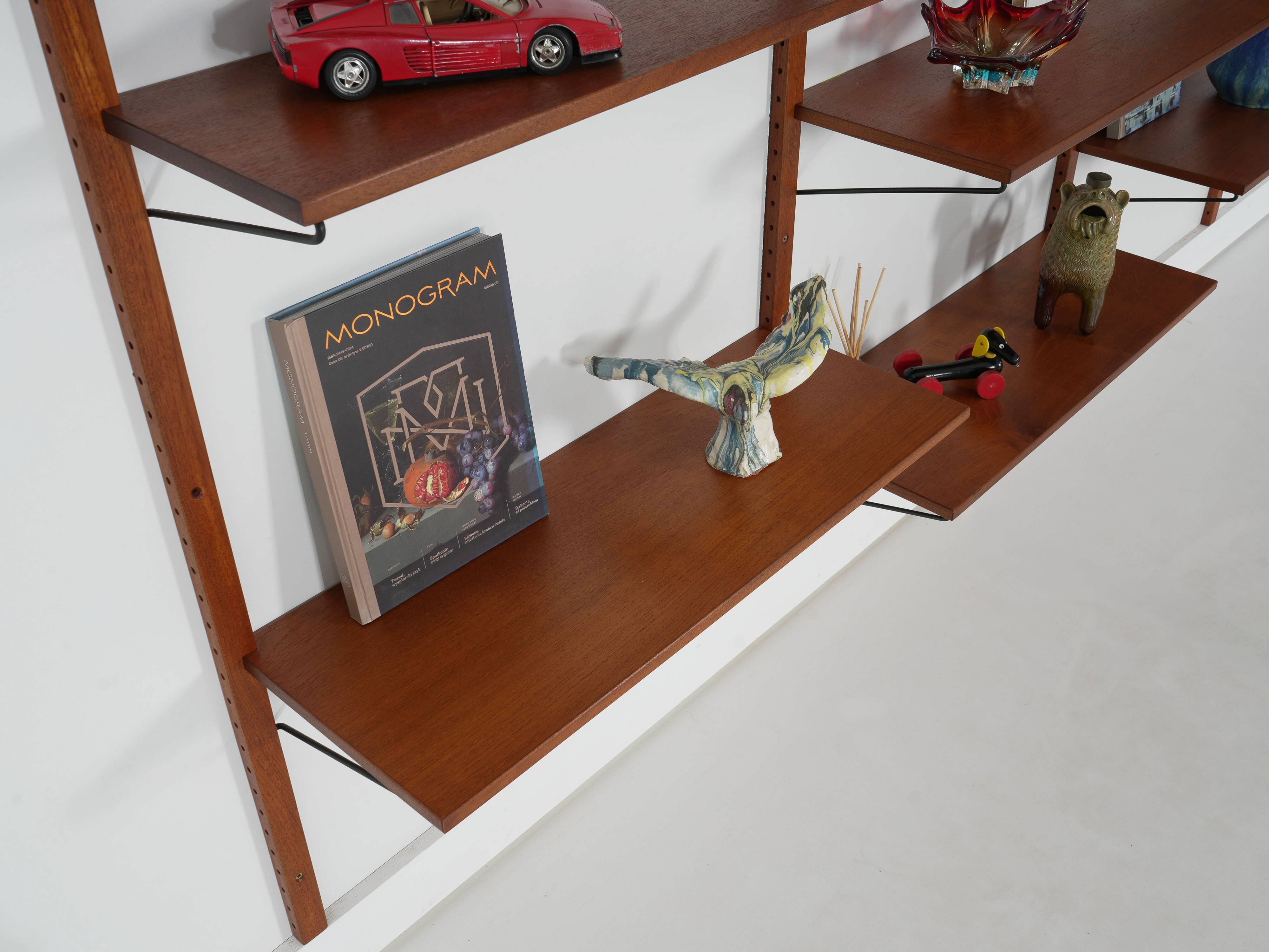 Modular shelving from the 1960s — Danish teak veneer wall system