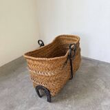 Magazine rack or log rack in straw with brutalist base from the 50s