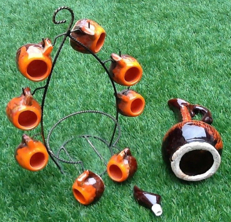 1960s-1970s liquor service including a decanter and 8 cups