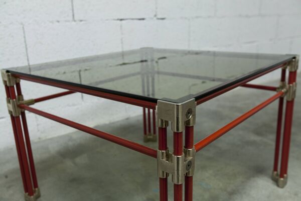 Table basse design italien postmodern en verre fumé structure acier rouge