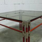 Postmodern Italian design coffee table in smoked glass with red steel structure