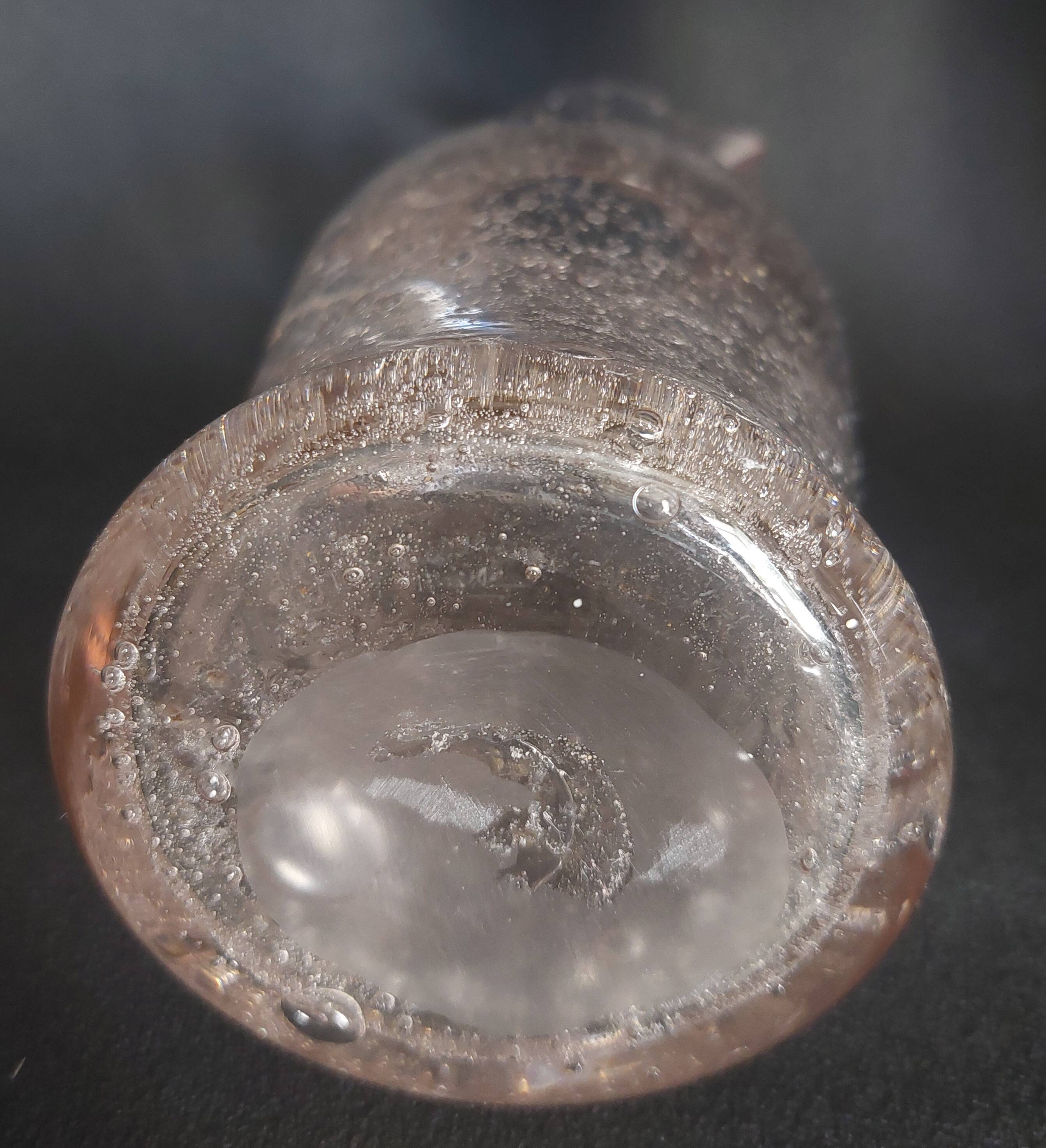 Small blown glass pitcher with bubbles from the 20th century.