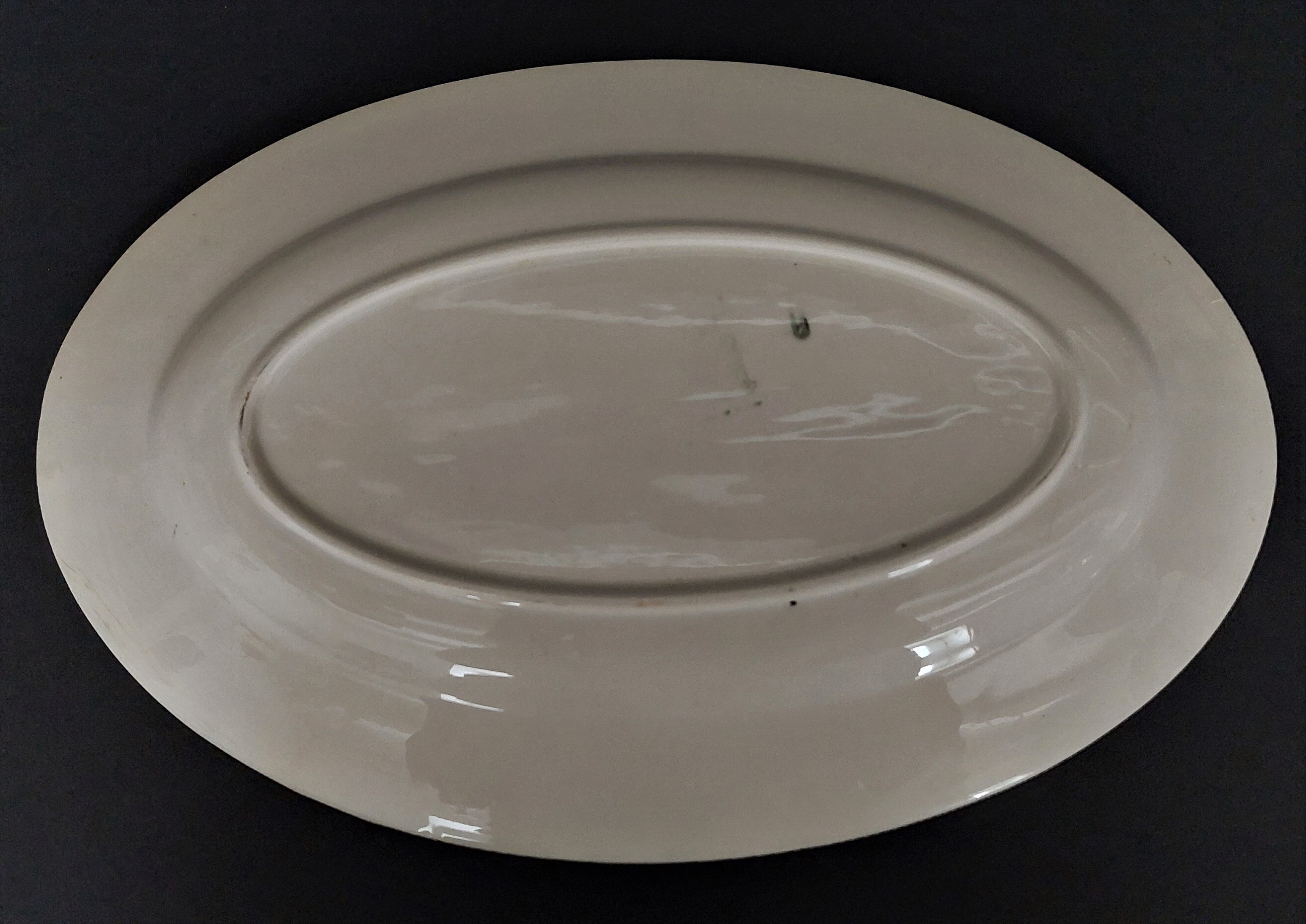 Oval Badonviller earthenware serving dish, early 20th century