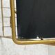 Gold metal and black glass side table
