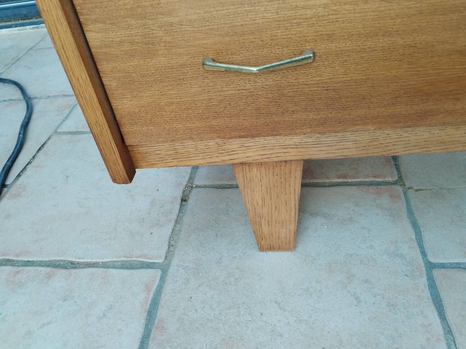 Old vintage chest of drawers with compass feet