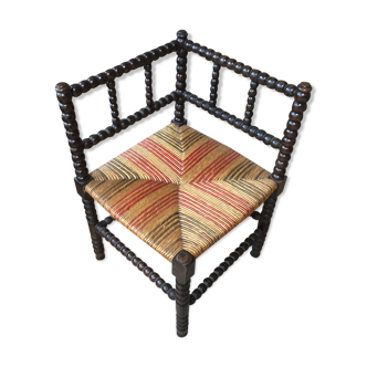 Two-coloured old fire-seated chair