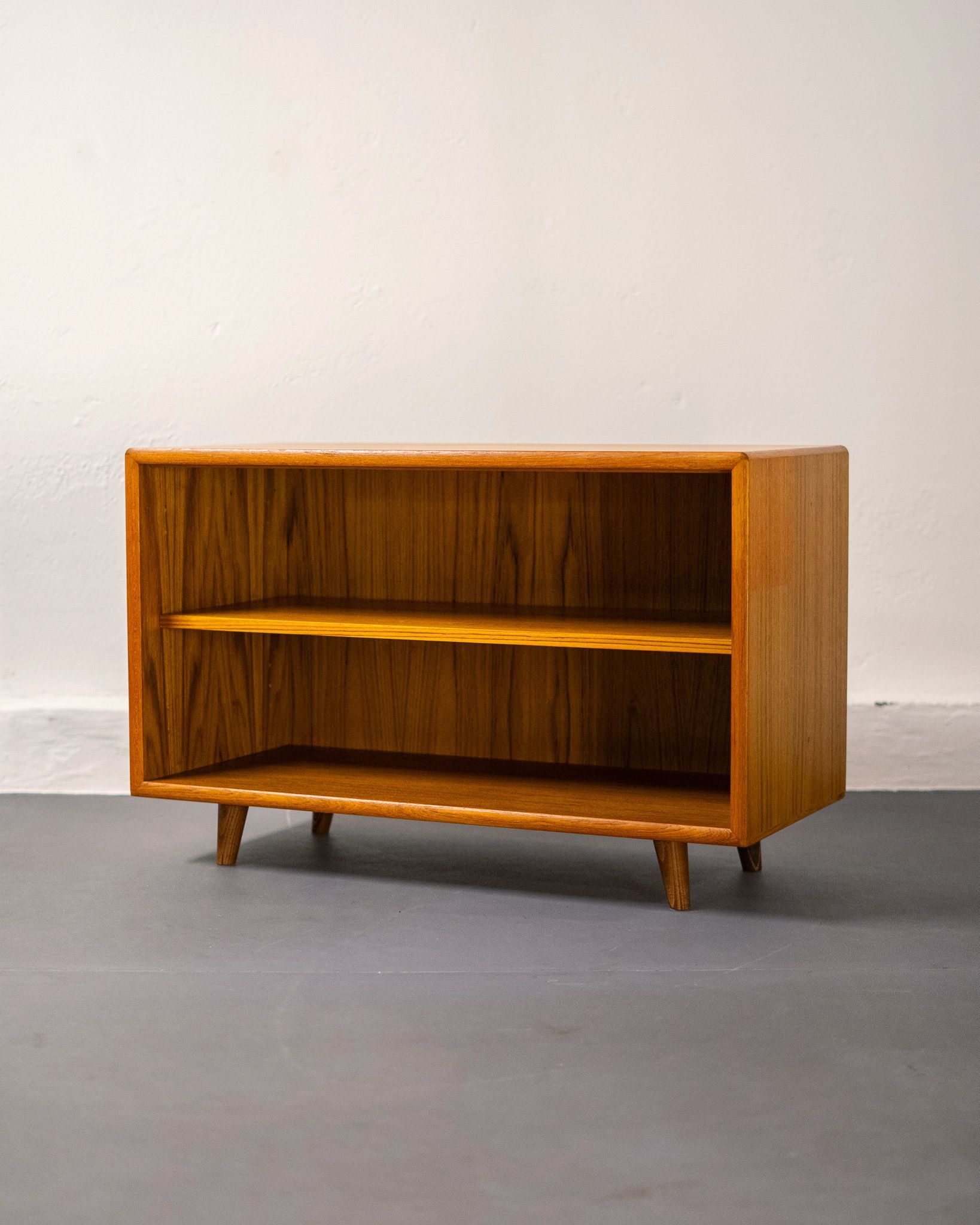 Mid-century low shelf in teak