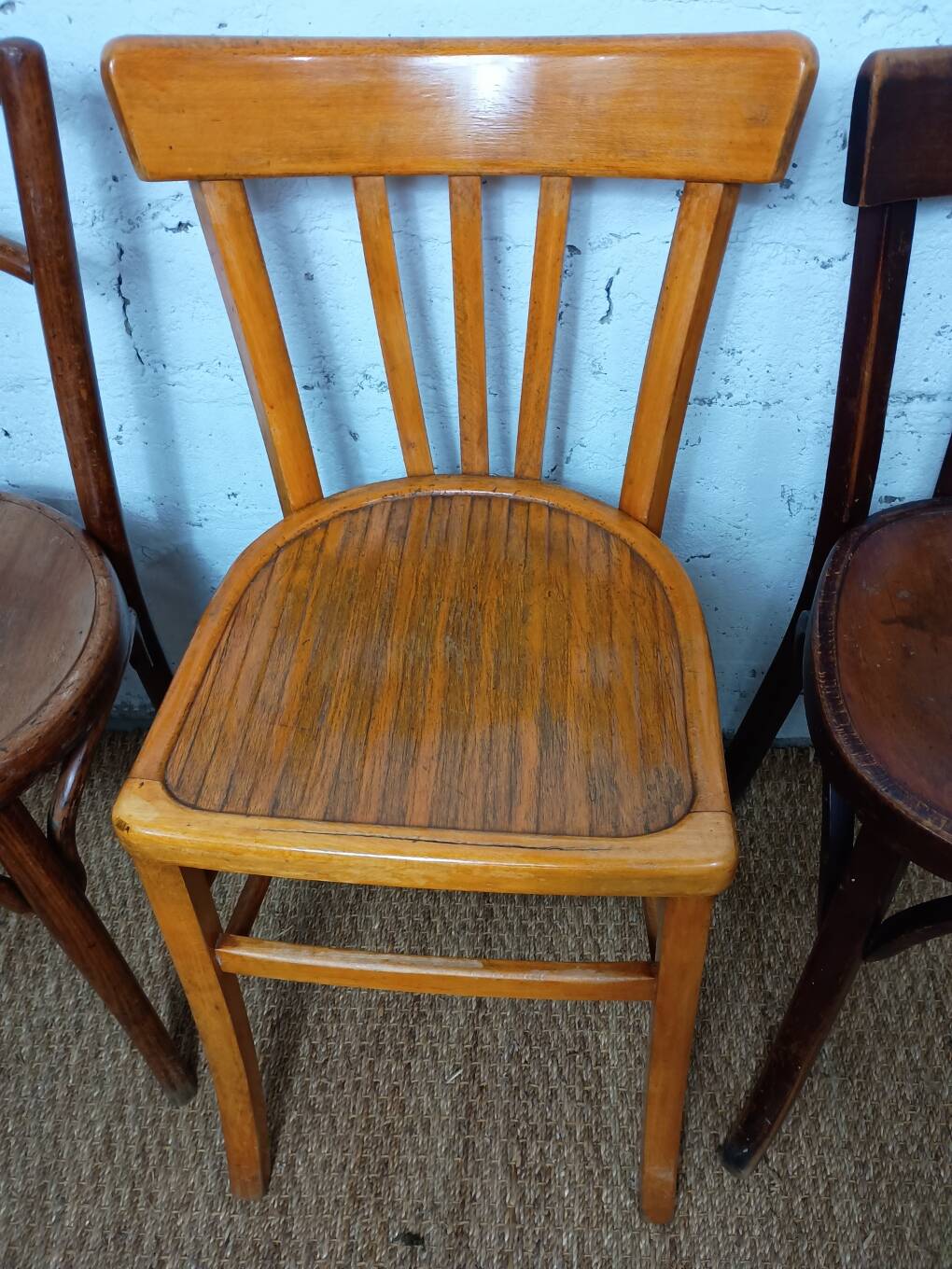 Set of 4 mismatched vintage Fischel bistro chairs