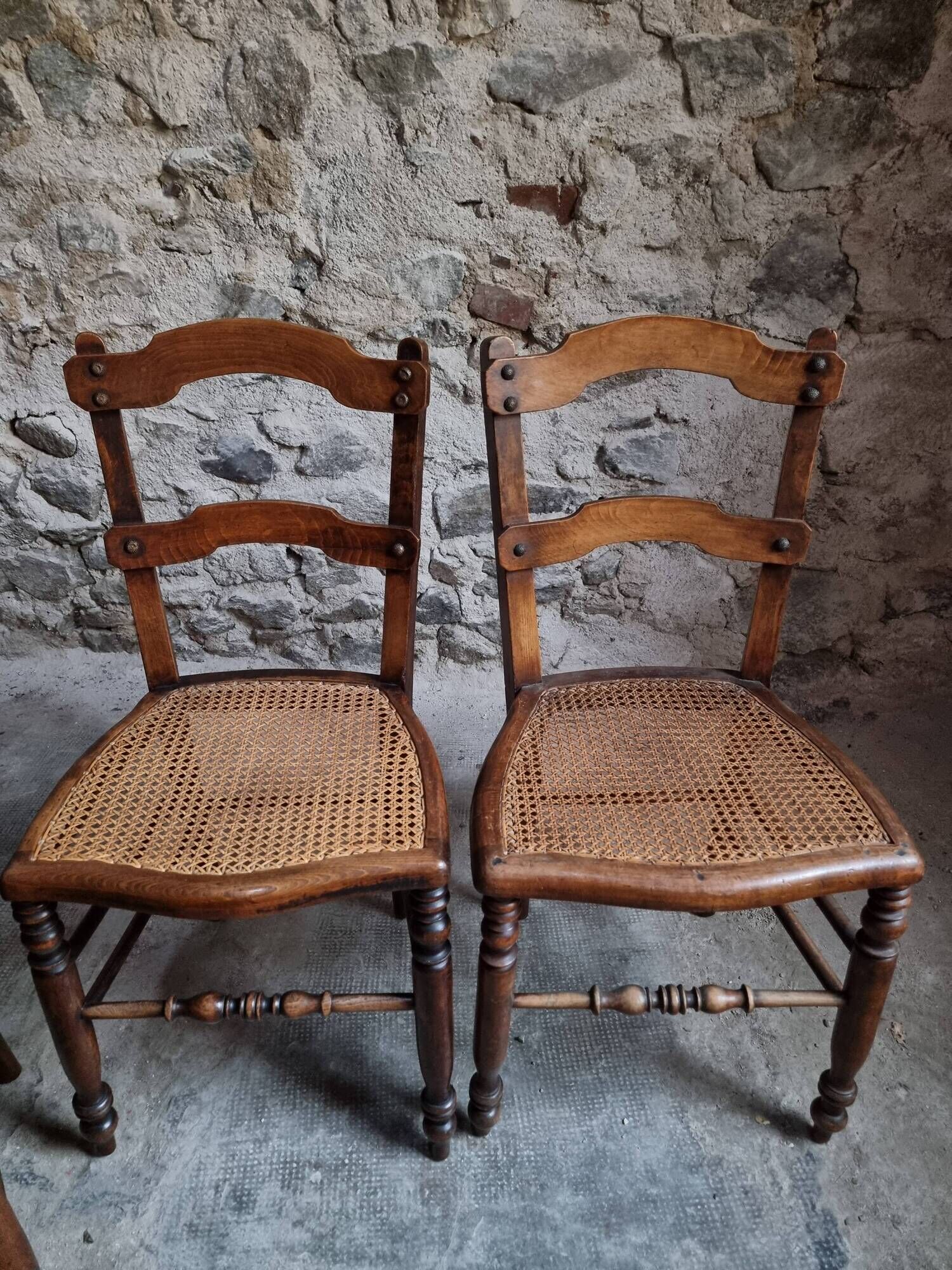 Set of 4 antique dining chairs with caned seats, beech, France, circa 1900–1920.