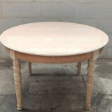 Round table with two raw cherry wood extensions