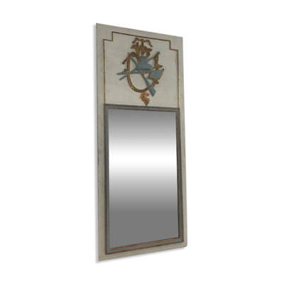 Miroir de style Louis XVI en bois sculpté patiné
