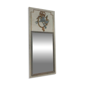 Miroir de style Louis XVI en bois sculpté patiné