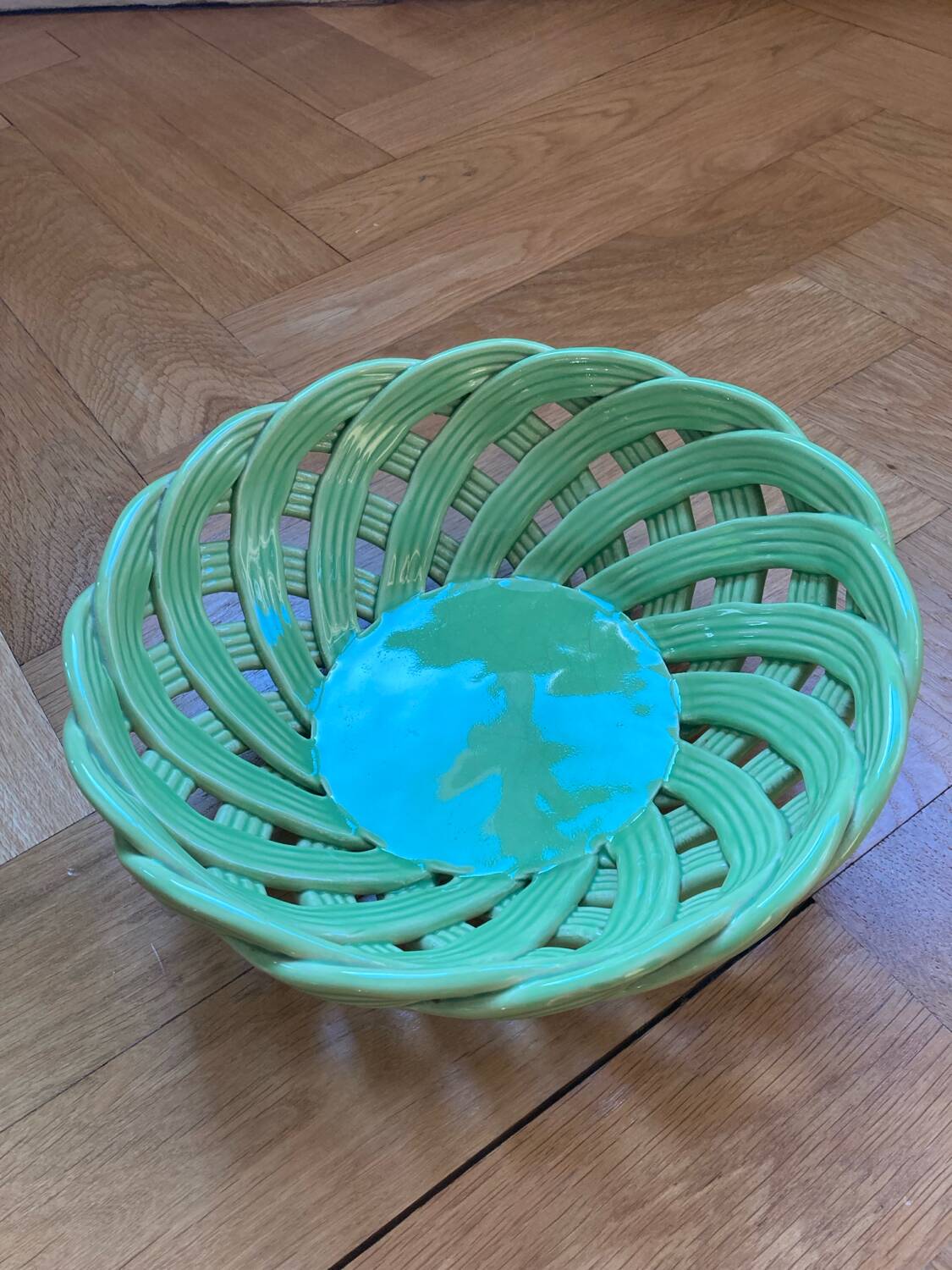Green woven ceramic basket