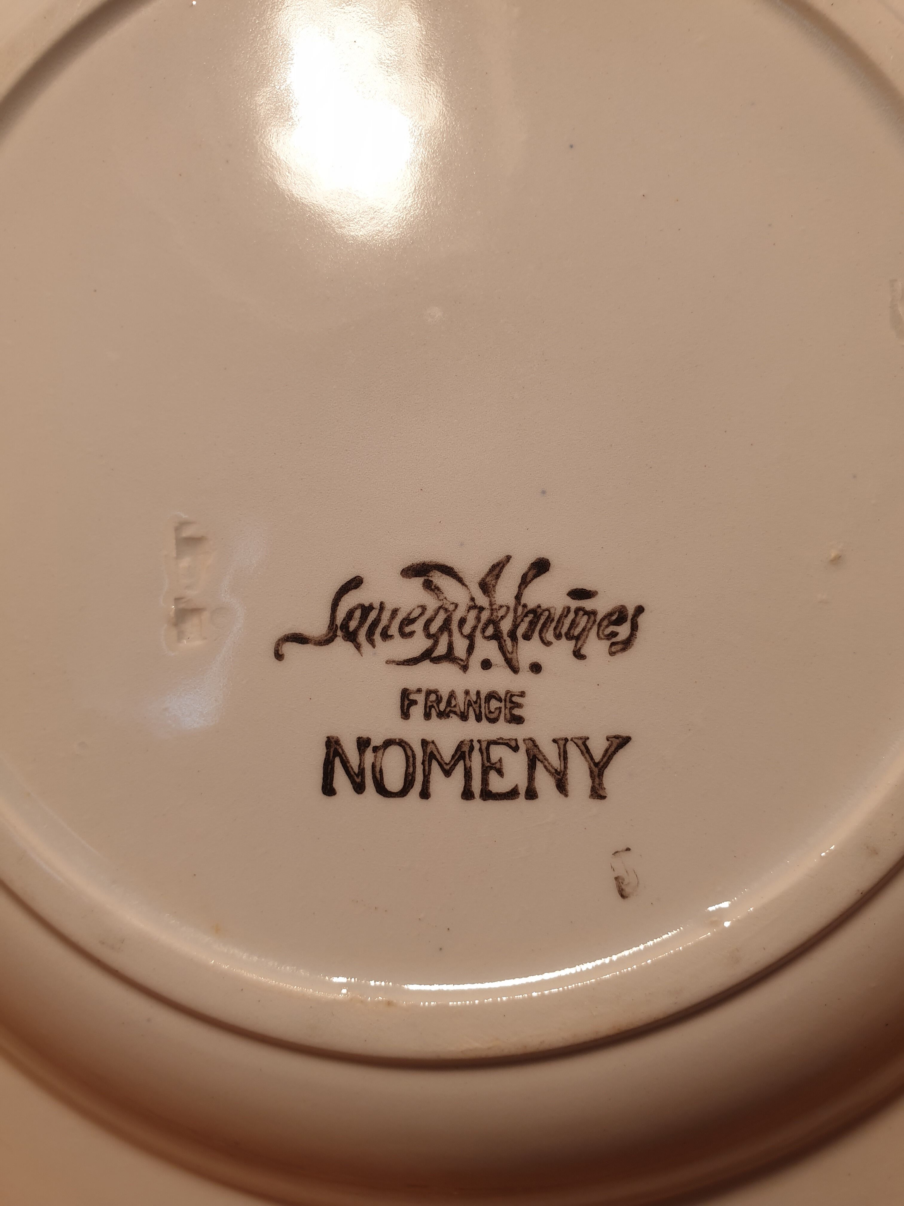 Suite of 7 hollow plates Saarguemines