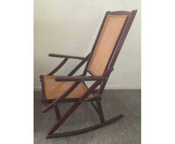 Folding wooden rocking chair and cannage from the 70s