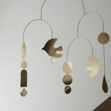 Mobile model Rana . Mobile in abstract brass.