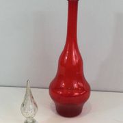 Large designer bottle in red glass