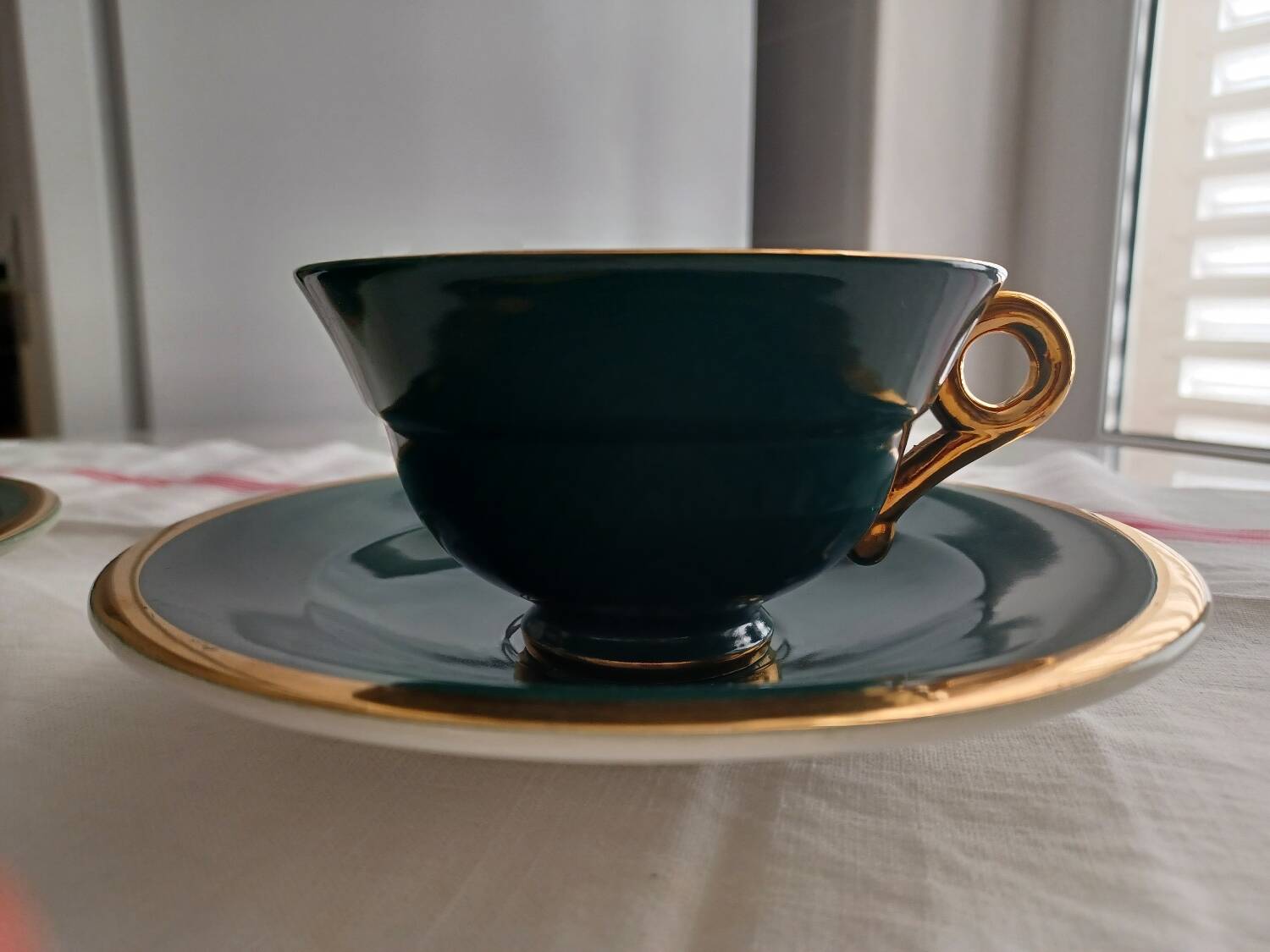 Dark green and gold cups from the 50s Salins.