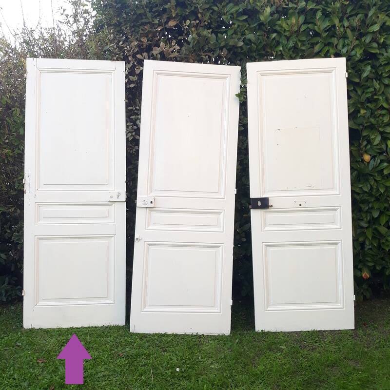 Communication door H220xW80.5cm, old panelled with moulding.